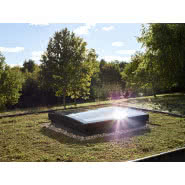 Okno do płaskiego dachu VELUX ze sferycznym modułem szklanym